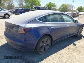 2020 Tesla Model 3 Standard Range Plus z VIN 5YJ3E1EA2LF739866, wystawiony jako IAAI lot #41842179 z przebiegiem 70 089 mil mil oraz . Historia ofert i sprzedaży dostępna na DreamBid. Obrazek 4.