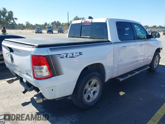 2022 Ram 1500 Big Horn with VIN 1C6SRFFT7NN242269, listed as a IAAI auction lot 41645255 with 96,658 mi miles. Bid and sale history available at carsss.com. Image 4.