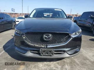 2019 Mazda CX-5 Touring with VIN JM3KFACM0K0667348, listed as a Copart auction lot 46369485 with 71,995 mi miles and Salvage Title. Bid and sale history available at carsss.com. Image 5.