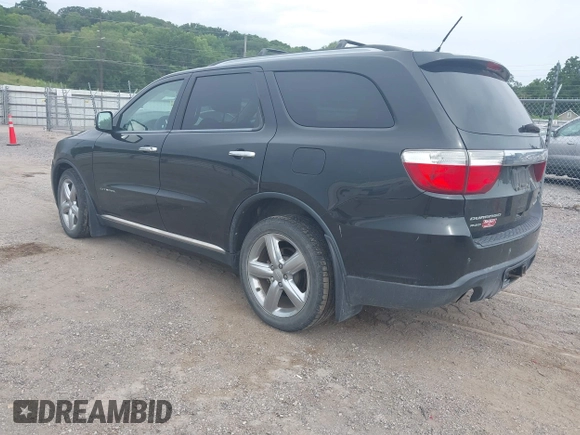 2013 Dodge Durango Citadel with VIN 1C4SDJET3DC563618, listed as a IAAI auction lot 42828144 with 202,648 mi miles and . Bid and sale history available at DreamBid. Image 3.