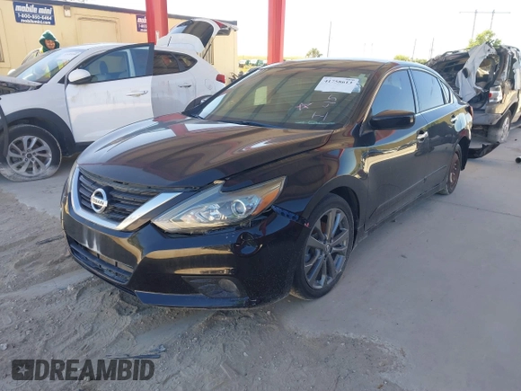 2018 Nissan Altima SV with VIN 1N4AL3APXJC297759, listed as a IAAI auction lot 41758613 with 77,527 mi miles and . Bid and sale history available at carsss.com. Image 2.