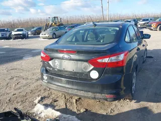 2014 Ford Focus S with VIN 1FADP3E26EL410628, listed as a IAAI auction lot 41590044 with 88,602 mi miles. Bid and sale history available at carsss.com. Image 15.