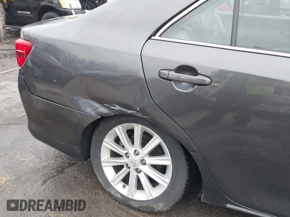 2012 Toyota Camry XLE z VIN 4T1BD1FK1CU048272, wystawiony jako IAAI lot #41711586 z przebiegiem 104 734 mil mil oraz . Historia ofert i sprzedaży dostępna na DreamBid. Obrazek 6.