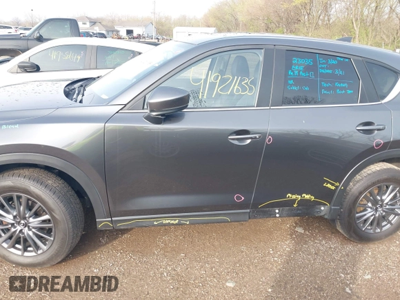 2020 Mazda CX-5 Touring with VIN JM3KFBCM8L0863951, listed as a IAAI auction lot 41921635 with 88,629 mi miles. Bid and sale history available at carsss.com. Image 14.