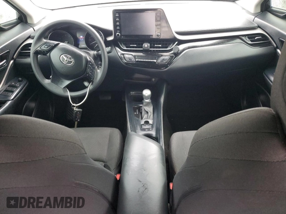 2020 Toyota C-HR LE with VIN NMTKHMBX1LR113300, listed as a Copart auction lot 49260125 with 104,106 mi miles and Salvage Title. Bid and sale history available at carsss.com. Image 8.