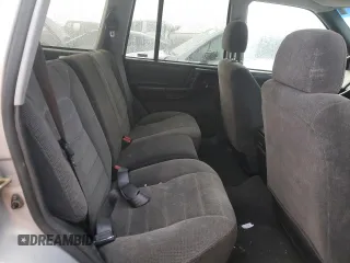 1997 Jeep Grand Cherokee Laredo with VIN 1J4GZ58Y6VC603370, listed as a Copart auction lot 82802794 with 0 mi miles and Salvage Title. Bid and sale history available at carsss.com. Image 10.