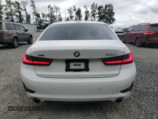 2021 BMW 3 Series 330i xDrive z VIN 3MW5R7J01M8C09484, wystawiony jako Copart lot #59128455 z przebiegiem 43 059 mil mil oraz Szkoda całkowita • Salvage title. Historia ofert i sprzedaży dostępna na DreamBid. Obrazek 6.