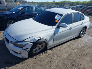 2015 BMW 3 Series 320i with VIN WBA3B1G57FNT02019, listed as a IAAI auction lot 42128277 with 218,621 mi miles and . Bid and sale history available at DreamBid. Image 18.