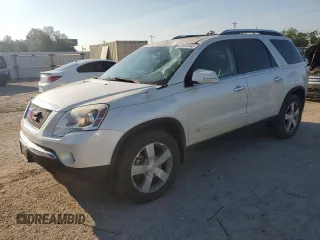 2010 GMC Acadia SLT1 with VIN 1GKLRMED7AJ100697, listed as a Copart auction lot 63454445 with 106,886 mi miles and Salvage title. Bid and sale history available at DreamBid. Image 1.