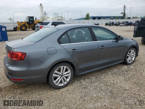 2014 Volkswagen Jetta GLI z VIN 3VW4T7AJ2EM245201, wystawiony jako Copart lot #64901935 z przebiegiem 147 799 mil mil oraz Czysty tytuł • Clean title. Historia ofert i sprzedaży dostępna na DreamBid. Obrazek 3.