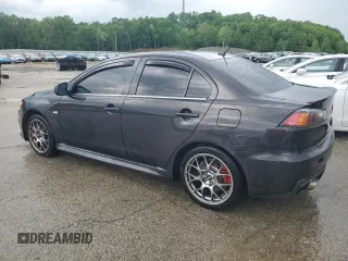 2011 Mitsubishi Lancer Evolution MR z VIN JA32W5FV6BU044263, wystawiony jako Copart lot #55415535 z przebiegiem 106 426 mil mil oraz Czysty tytuł • Clean title. Historia ofert i sprzedaży dostępna na DreamBid. Obrazek 2.