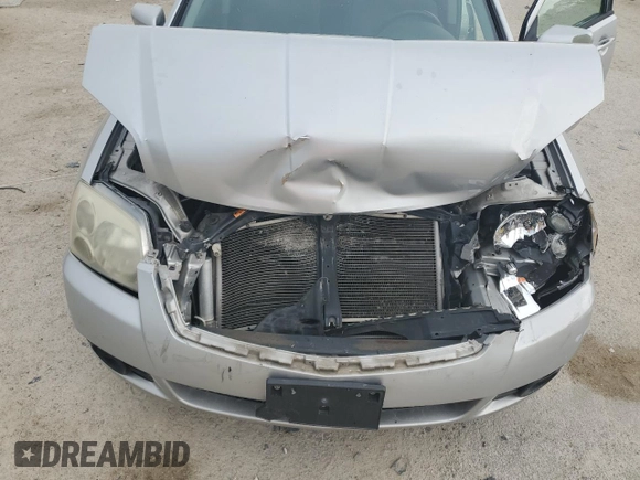 2012 Mitsubishi Galant FE z VIN 4A32B2FF0CE021610, wystawiony jako Copart lot #54020525 z przebiegiem 103 096 mil mil oraz Szkoda całkowita • Salvage title. Historia ofert i sprzedaży dostępna na DreamBid. Obrazek 11.