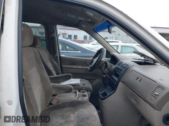 2004 Kia Sedona LX with VIN KNDUP131446537660, listed as a IAAI auction lot 41526183 with 282,891 mi miles. Bid and sale history available at carsss.com. Image 5.