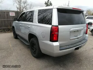2016 Chevrolet Tahoe Commercial with VIN 1GNSKDEC5GR368328, listed as a IAAI auction lot 41975629 with 104,205 mi miles. Bid and sale history available at carsss.com. Image 3.