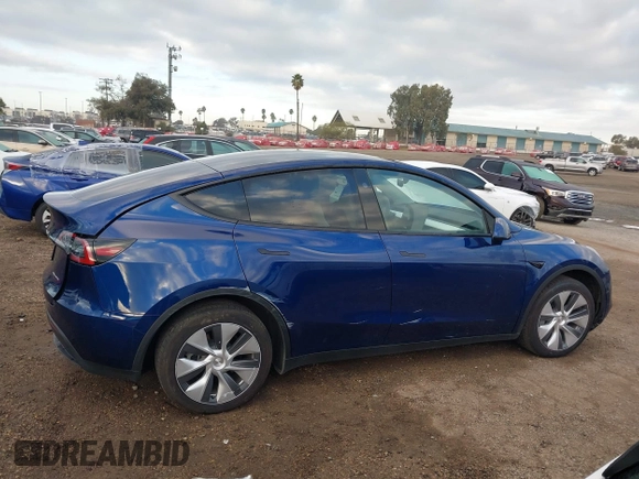 2023 Tesla Model Y Long Range with VIN 7SAYGDEE6PF947827, listed as a IAAI auction lot 41443524 with 12,381 mi miles and . Bid and sale history available at DreamBid. Image 13.