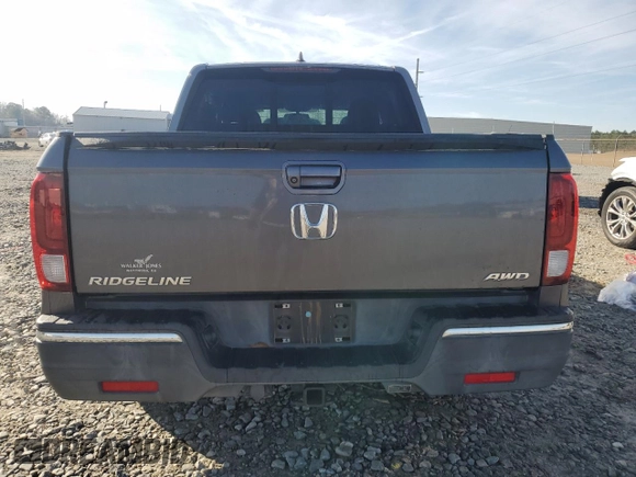 2019 Honda Ridgeline RTL-T with VIN 5FPYK3F63KB019325, listed as a Copart auction lot 43327725 with 63,124 mi miles and Salvage title. Bid and sale history available at DreamBid. Image 6.
