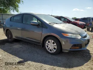 2012 Honda Insight z VIN JHMZE2H34CS003929, wystawiony jako Copart lot #52707885 z przebiegiem 131 596 mil mil oraz Szkoda całkowita • Salvage title. Historia ofert i sprzedaży dostępna na DreamBid. Obrazek 4.