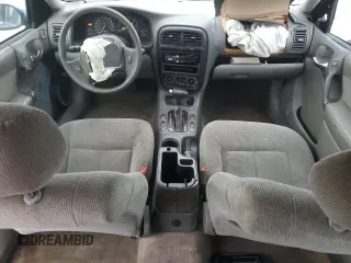 2002 Saturn LS z VIN 1G8JU54F72Y581967, wystawiony jako Copart lot #74521994 z przebiegiem 215 018 mil mil oraz Szkody całkowita. Historia ofert i sprzedaży dostępna na DreamBid. Obrazek 8.
