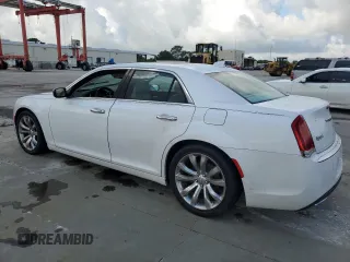 2015 Chrysler 300 C with VIN 2C3CCAET3FH830414, listed as a Copart auction lot 73649014 with Not Provided miles and Salvage Title. Bid and sale history available at DreamBid. Image 2.