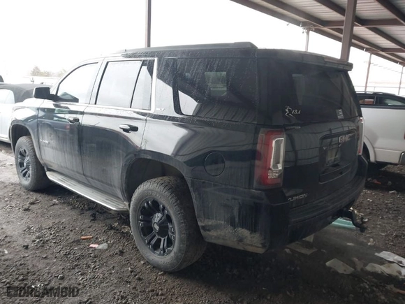2017 GMC Yukon SLT with VIN 1GKS2BKC6HR171918, listed as a IAAI auction lot 41553393 with 106,766 mi miles. Bid and sale history available at carsss.com. Image 3.