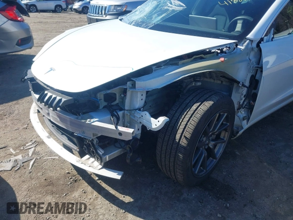 2020 Tesla Model 3 Long Range with VIN 5YJ3E1EBXLF636963, listed as a IAAI auction lot 41826249 with 68,085 mi miles. Bid and sale history available at carsss.com. Image 6.