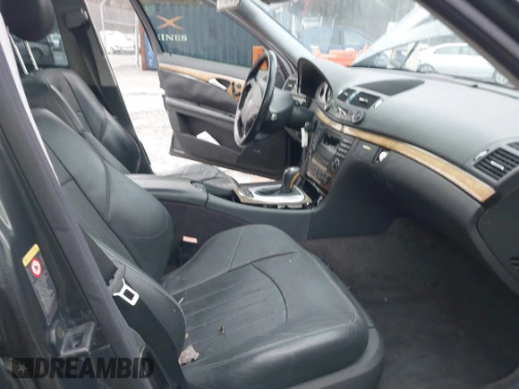 2003 Mercedes-Benz E-Class 5.5L AMG with VIN WDBUF76JX3A267197, listed as a IAAI auction lot 41485778 with 89,310 mi miles. Bid and sale history available at carsss.com. Image 5.