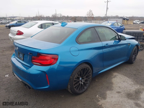 2021 BMW M2 Competition with VIN WBS2U7C02M7H63454, listed as a IAAI auction lot 41063808 with 15,047 mi miles. Bid and sale history available at carsss.com. Image 4.