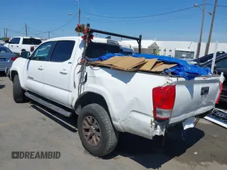2016 Toyota Tacoma SR5 with VIN 5TFAX5GN8GX053836, listed as a IAAI auction lot 41973740 with 191,653 mi miles. Bid and sale history available at carsss.com. Image 3.