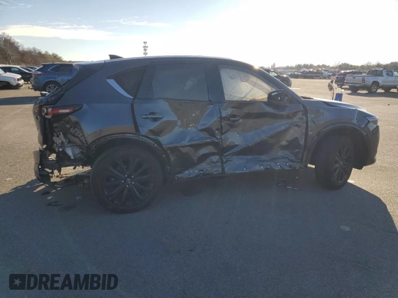 2022 Mazda CX-5 2.5 Turbo with VIN JM3KFBAY2N0596945, listed as a Copart auction lot 86427694 with Not Provided miles and Salvage Title. Bid and sale history available at carsss.com. Image 3.