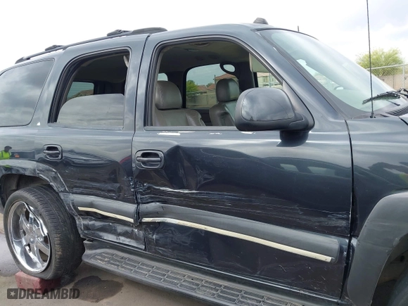 2004 Chevrolet Tahoe LT with VIN 1GNEK13T54J146851, listed as a IAAI auction lot 41990571 with 172,025 mi miles. Bid and sale history available at carsss.com. Image 13.