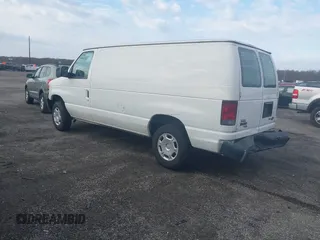 2013 Ford Econoline Cargo Commercial with VIN 1FTNE1EW4DDA09857, listed as a IAAI auction lot 41889302 with 131,059 mi miles and . Bid and sale history available at DreamBid. Image 3.