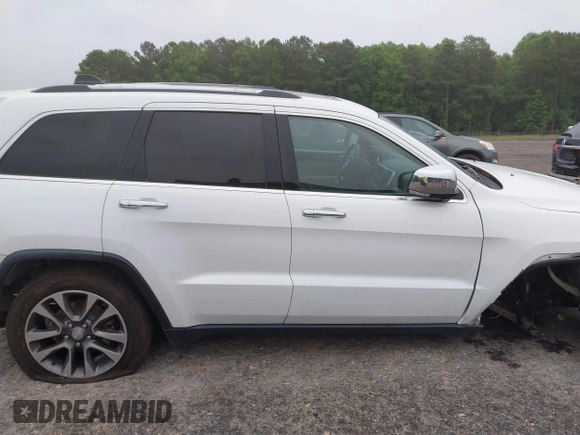 2018 Jeep Grand Cherokee Limited with VIN 1C4RJFBG8JC245999, listed as a IAAI auction lot 42345499 with 90,670 mi miles and . Bid and sale history available at DreamBid. Image 13.