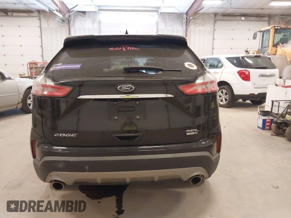2020 Ford Edge SEL z VIN 2FMPK4J95LBA90533, wystawiony jako IAAI lot #42151916 z przebiegiem 57 197 mil mil oraz . Historia ofert i sprzedaży dostępna na DreamBid. Obrazek 16.