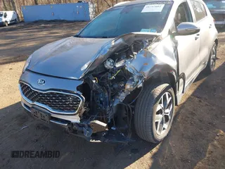 2021 Kia Sportage EX with VIN KNDPNCAC8M7854533, listed as a IAAI auction lot 41757662 with 25,051 mi miles and . Bid and sale history available at DreamBid. Image 6.