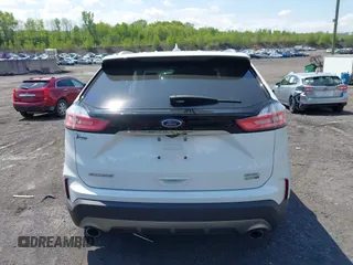 2020 Ford Edge SEL z VIN 2FMPK4J95LBA31157, wystawiony jako IAAI lot #42225863 z przebiegiem 96 082 mil mil oraz . Historia ofert i sprzedaży dostępna na DreamBid. Obrazek 16.