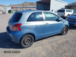 2007 Toyota Yaris with VIN JTDJT923475072209, listed as a IAAI auction lot 42139042 with 335,137 mi miles. Bid and sale history available at carsss.com. Image 4.