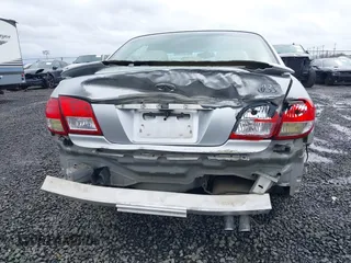2002 Infiniti I35 Luxury with VIN JNKDA31A22T005398, listed as a IAAI auction lot 41818757 with 165,228 mi miles. Bid and sale history available at carsss.com. Image 6.