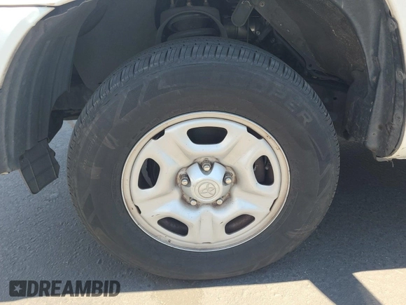 2013 Toyota Tacoma with VIN 5TFTX4CN0DX023945, listed as a IAAI auction lot 42848918 with 322,066 mi miles and . Bid and sale history available at DreamBid. Image 6.