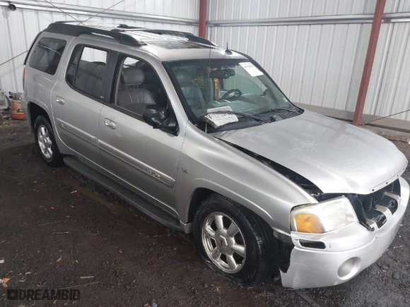 2004 GMC Envoy XL SLT with VIN 1GKET16P946231879, listed as a IAAI auction lot 41943418 with 212,102 mi miles. Bid and sale history available at carsss.com. Image 1.