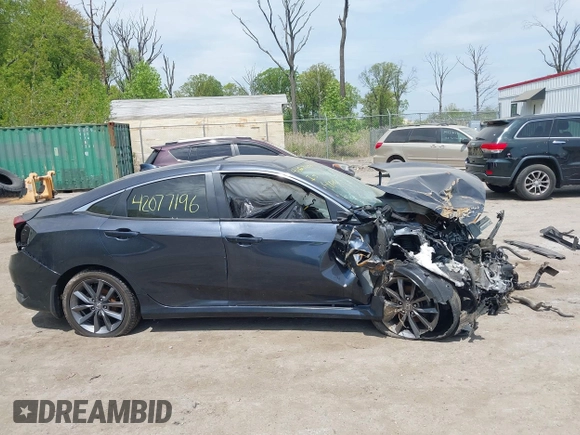 2019 Honda Civic EX z VIN JHMFC1F37KX008758, wystawiony jako IAAI lot #42077196 z przebiegiem Nie podano mil oraz . Historia ofert i sprzedaży dostępna na DreamBid. Obrazek 12.