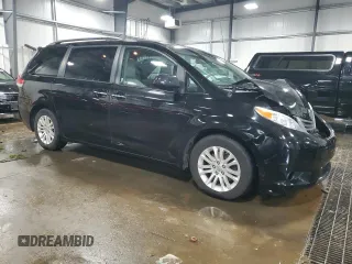 2013 Toyota Sienna XLE AAS with VIN 5TDYK3DC3DS392512, listed as a Copart auction lot 52815845 with 128,561 mi miles and Salvage Title. Bid and sale history available at carsss.com. Image 4.