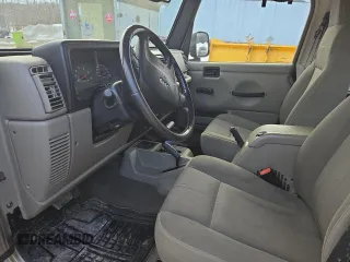 2004 Jeep Wrangler Sahara with VIN 1J4FA59S64P774768, listed as a Copart auction lot 49868895 with 120,800 mi miles and Salvage Title. Bid and sale history available at DreamBid. Image 7.