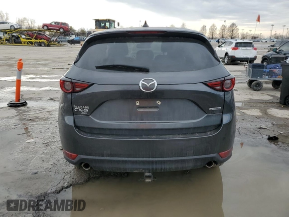 2021 Mazda CX-5 Grand Touring with VIN JM3KFBDM9M0452011, listed as a Copart auction lot 46230945 with 54,825 mi miles and Salvage Title. Bid and sale history available at carsss.com. Image 6.