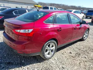 2013 Ford Focus SE with VIN 1FADP3F29DL283340, listed as a IAAI auction lot 41814829 with 119,199 mi miles. Bid and sale history available at carsss.com. Image 4.