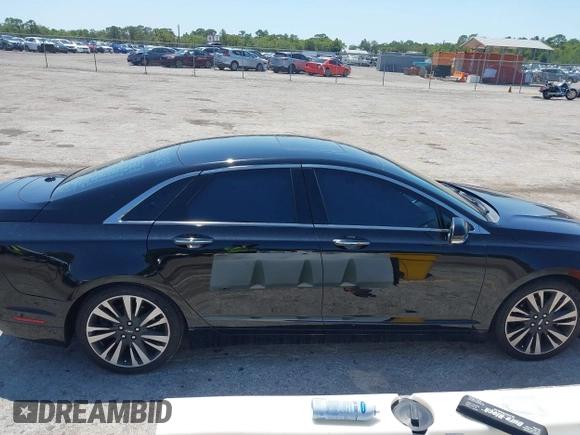 2018 Lincoln MKZ Reserve z VIN 3LN6L5E91JR602506, wystawiony jako IAAI lot #41976529 z przebiegiem 93 394 mil mil oraz . Historia ofert i sprzedaży dostępna na DreamBid. Obrazek 13.