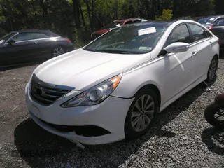 2014 Hyundai Sonata SE with VIN 5NPEC4AC3EH896740, listed as a IAAI auction lot 40032340 with 131,394 mi miles and . Bid and sale history available at DreamBid. Image 2.