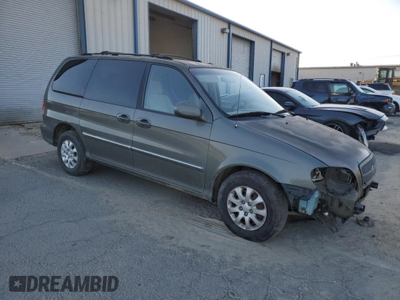 2005 Kia Sedona LX with VIN KNDUP132256734210, listed as a Copart auction lot 48902665 with 63,231 mi miles and Salvage Title. Bid and sale history available at carsss.com. Image 4.