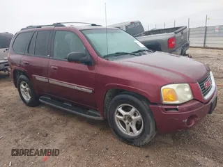 2003 GMC Envoy SLT with VIN 1GKDS13S532314397, listed as a IAAI auction lot 41184274 with 232,750 mi miles. Bid and sale history available at carsss.com. Image 1.