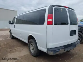2014 Chevrolet Express Passenger LT with VIN 1GAZG1FG6E1119310, listed as a IAAI auction lot 41913430 with 130,442 mi miles. Bid and sale history available at carsss.com. Image 3.