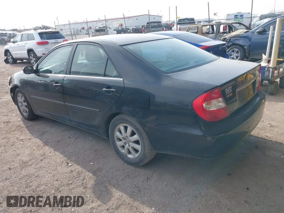 2003 Toyota Camry LE with VIN 4T1BE32K33U176270, listed as a IAAI auction lot 41995146 with 223,032 mi miles and . Bid and sale history available at DreamBid. Image 3.